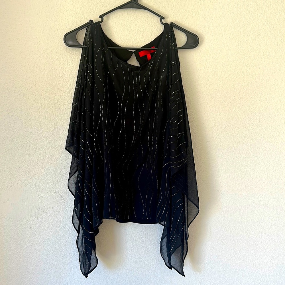 Fancy black shirt. Jennifer Lopez. Size L.G. sleeves are open refer to pics
